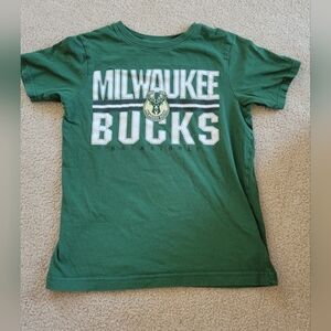 Milwaukee Bucks youth medium tshirt used stain on back. didnt try and treat it.